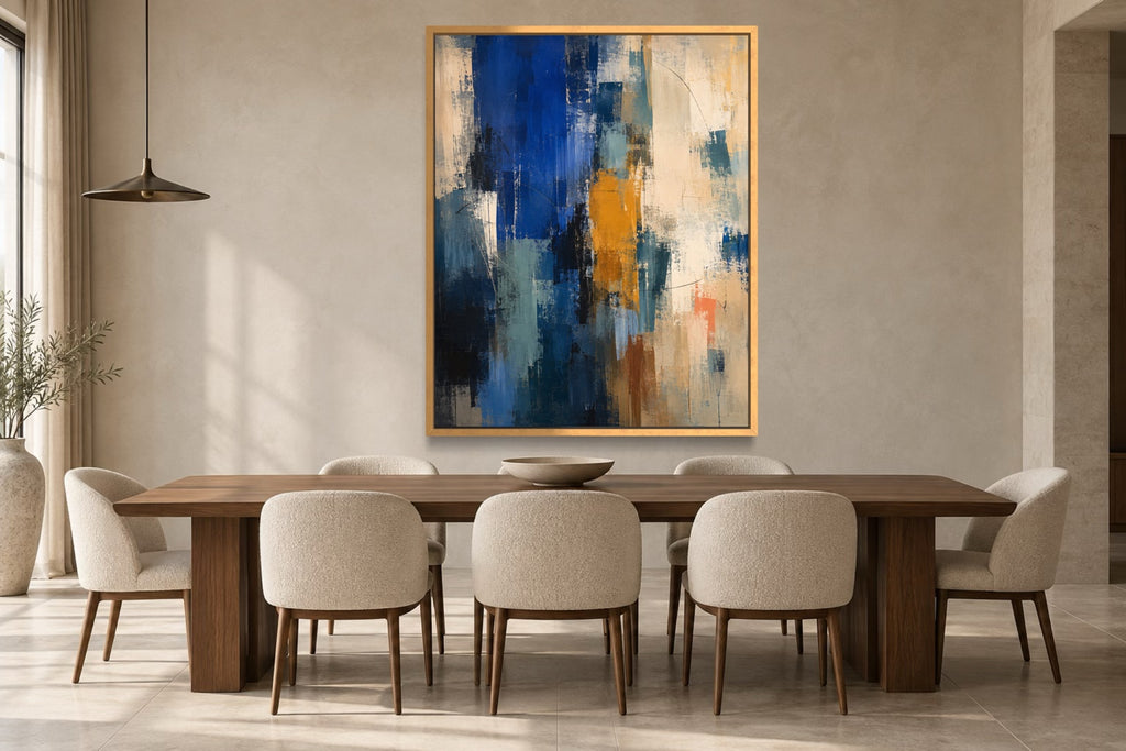 Cobalt Shift blue abstract wall art above a walnut dining table in a warm contemporary dining room