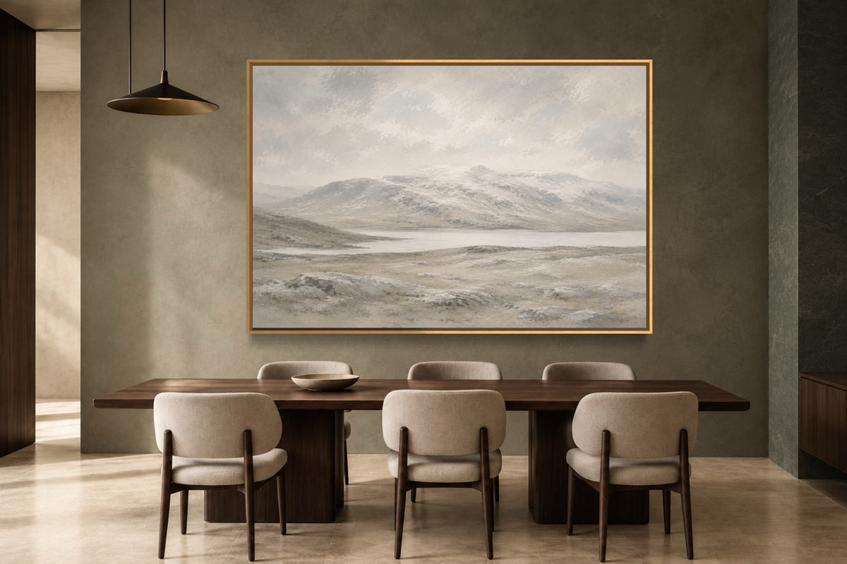 Winter Stone pale mountain landscape wall art above a walnut dining table