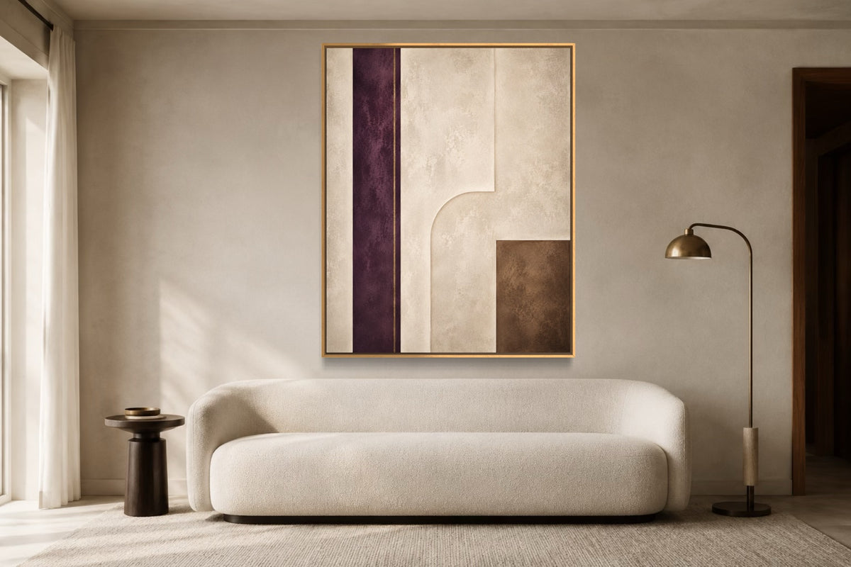 Plum Interval light plum and ivory geometric abstract wall art above an ivory sofa