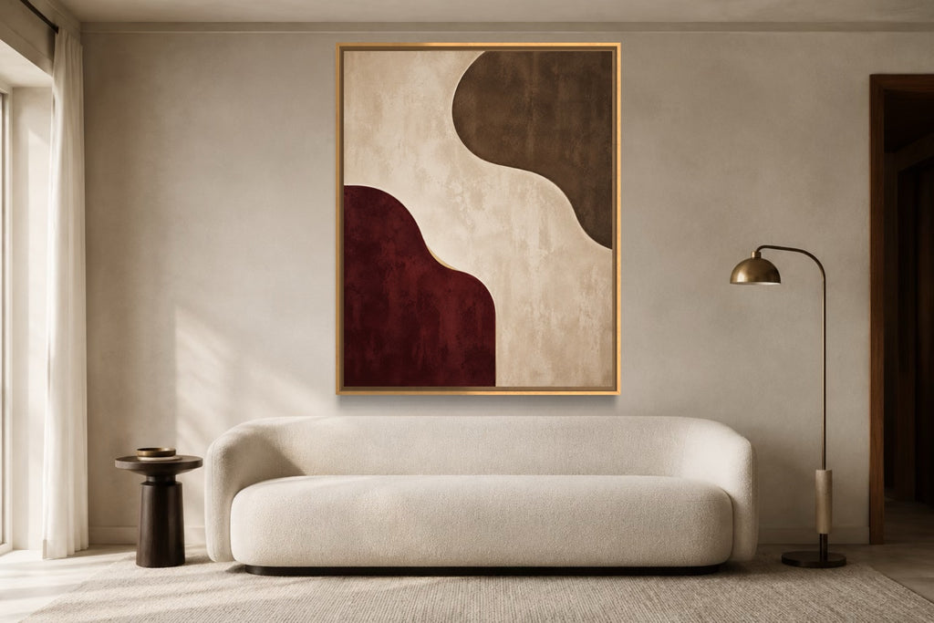 Burgundy Interval burgundy and warm ivory abstract wall art above an ivory sofa