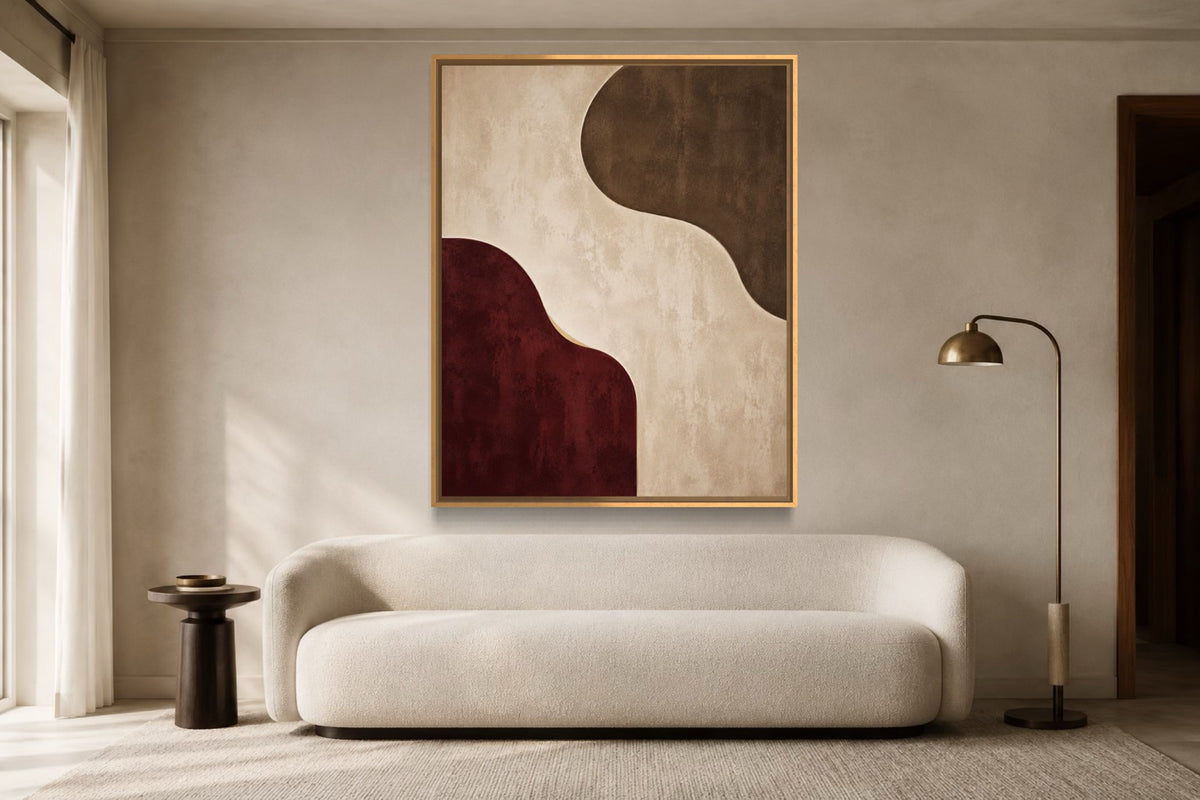 Burgundy Interval burgundy and warm ivory abstract wall art above an ivory sofa