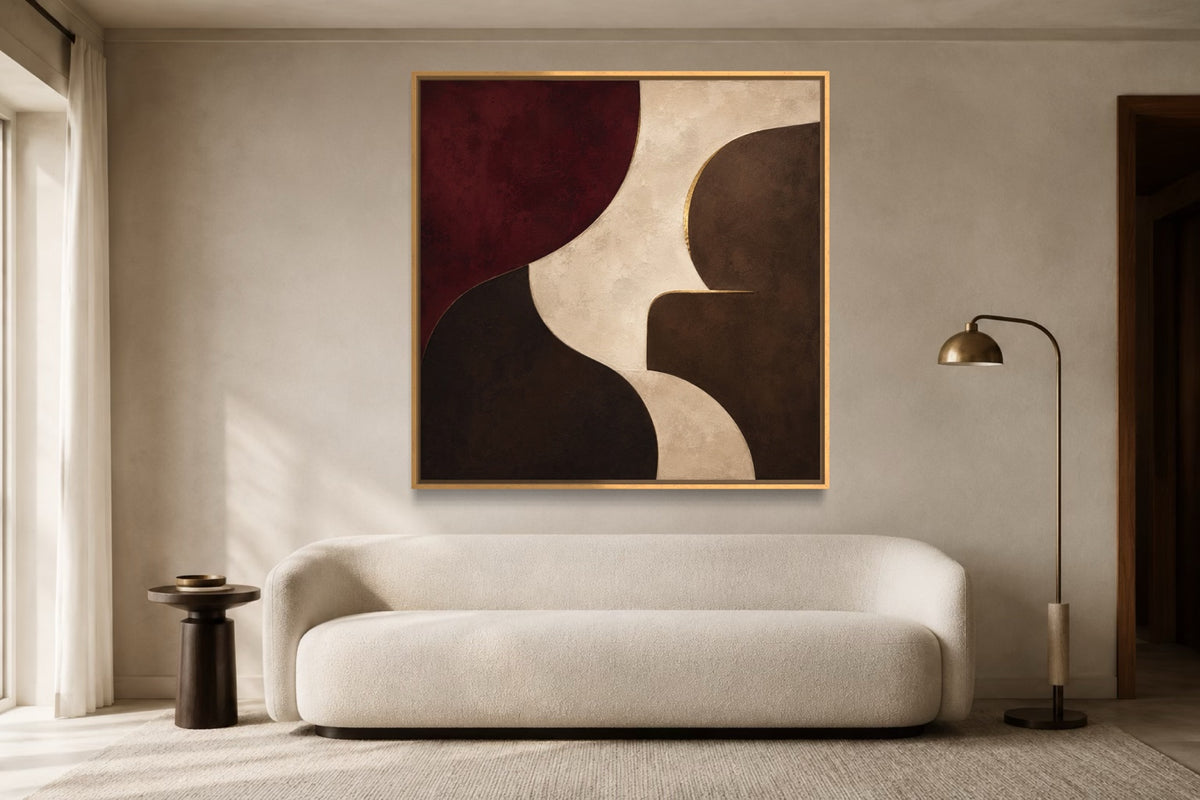 Burgundy Chamber dark burgundy square geometric abstract wall art above an ivory sofa