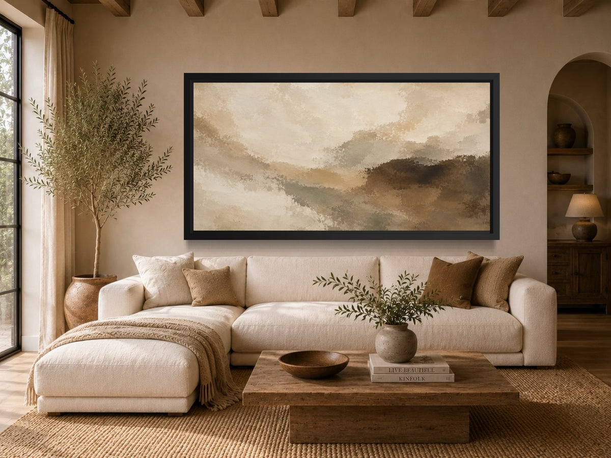 Horizon wide neutral abstract wall art displayed above a cream sofa in a warm modern organic living room